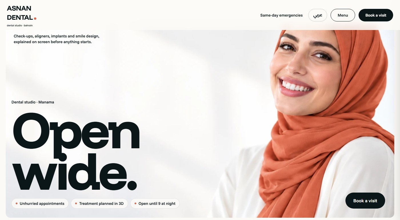Demo website for a fictional dental studio: a large Open wide headline, a smiling patient and a Book a visit button