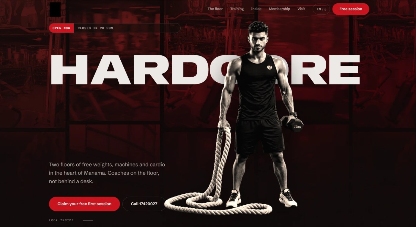 Gym website hero: an open-now badge with the time to closing, a free first session button and a call button